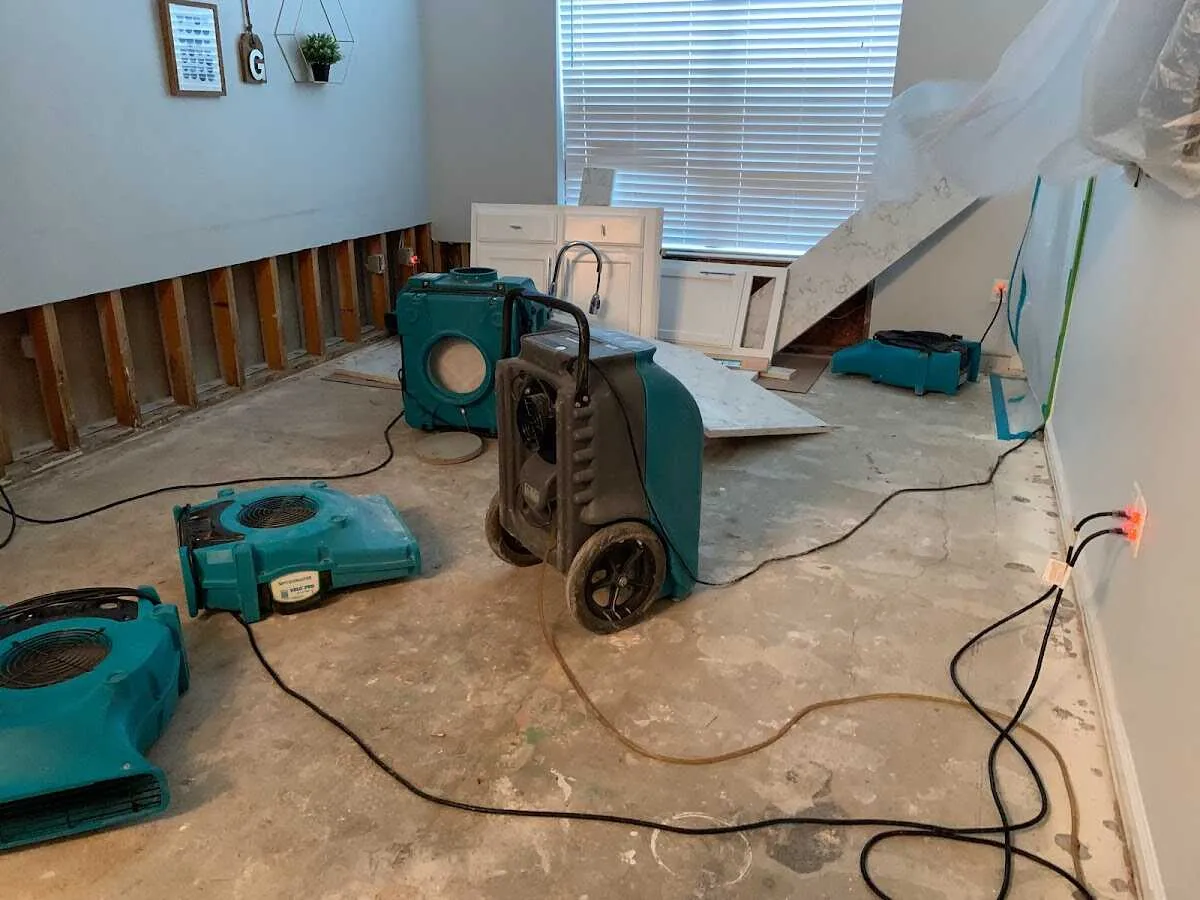 Dehumidifier in flood-cut room for Water Damage Restoration in Spring